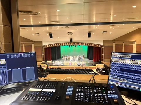 A lighting console and monitors overlooking a Rexburg Community Theatre rehearsal.
