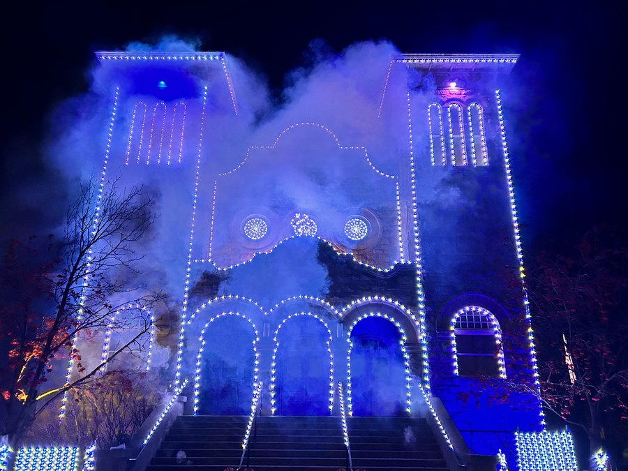 The Rexburg Tabernacle in blue light and fog, 2023